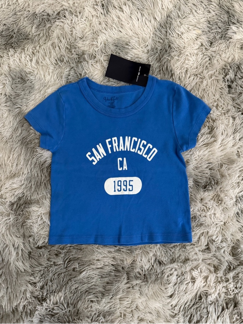 RARE BRANDY MELVILLE NWT San
Francisco Ashlyn top blue baby tee